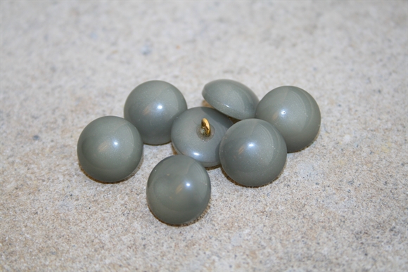 Søgrøn halvkugleformet øjeknap