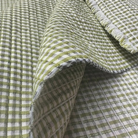 Quiltet bomulds stof med grønne tern