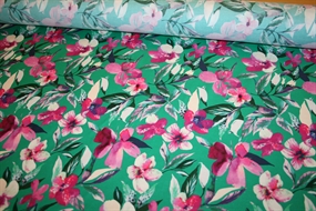 Twillvævet bomulds stof med pink blomster på en græsgrøn bund