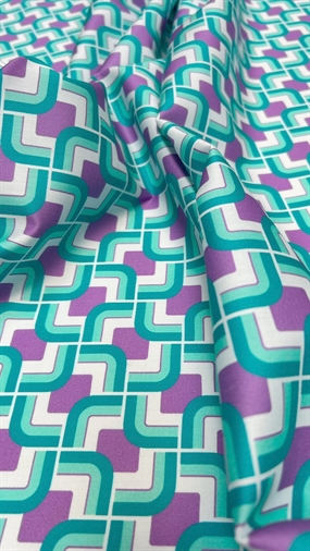 Deadstock bomuld med lilla/turkis retro print