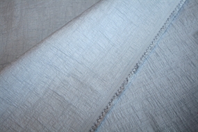 Støvet lyseblå bomuldsblanding