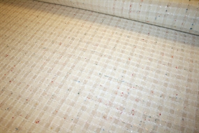 Hvid ternet uld bouclé stof