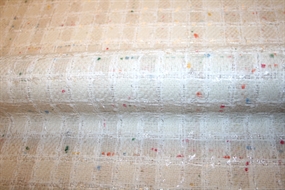 Hvid ternet uld bouclé stof