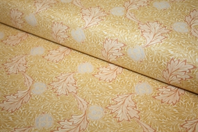 William Morris stof "Apple Gold" – snoede akantusblade og stiliserede frugter i gyldne nuancer på bomuld.