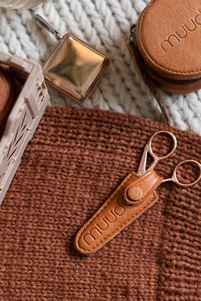 Muud saksehylster i brunt læder