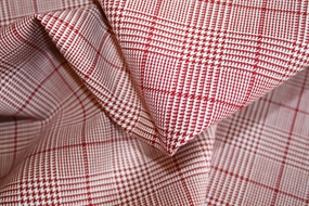 Twillvævet uld med rød/hvide tern