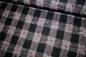 Ternet uldstof i grå, sort og rød