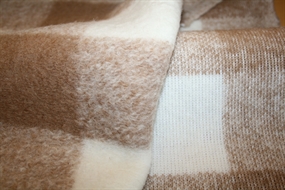 Ternet uldstrik til overtøj