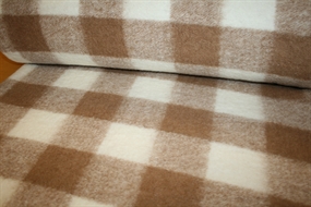 Ternet uldstrik til overtøj