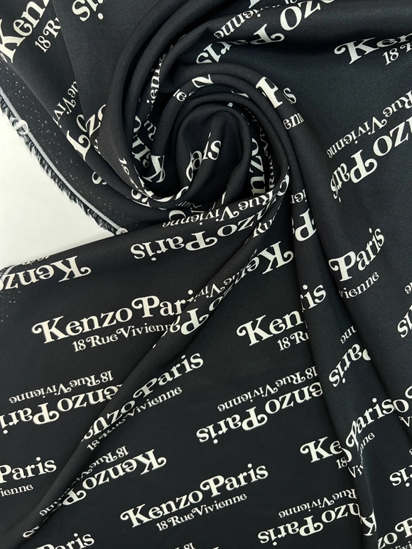 Twillvævet viscose stof med logo print