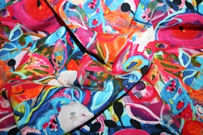 Vævet viskose med farvestrålende blomster