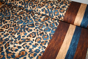 Twillvævet viscose med leopardprint og bort