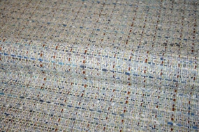 Bouclé stof i blå/brune nuancer