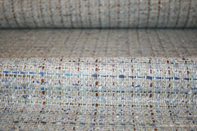 Bouclé stof i blå/brune nuancer